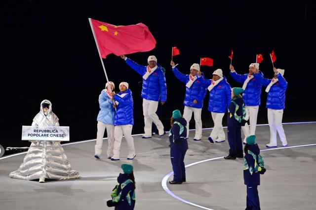 (260206) -- MILAN, Feb. 6, 2026 (Xinhua) -- The delegation of China parades into the San Siro Olympic Stadium during the opening ceremony of the Milan-Cortina 2026 Olympic Winter Games in Milan, Italy, Feb. 6, 2026. (Xinhua/Tao Xiyi)