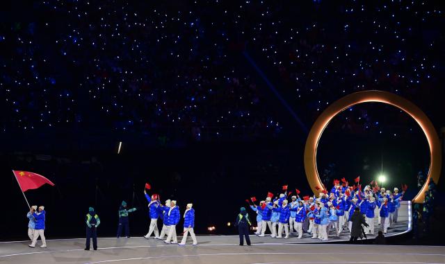 (260206) -- MILAN, Feb. 6, 2026 (Xinhua) -- The delegation of China parades into the San Siro Olympic Stadium during the opening ceremony of the Milan-Cortina 2026 Olympic Winter Games in Milan, Italy, Feb. 6, 2026. (Xinhua/Tao Xiyi)