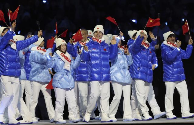 (260206) -- MILAN, Feb. 6, 2026 (Xinhua) -- The delegation of China parades into the San Siro Olympic Stadium during the opening ceremony of the Milan-Cortina 2026 Olympic Winter Games in Milan, Italy, Feb. 6, 2026. (Xinhua/Li Jing)
