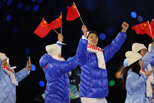(260206) -- MILAN, Feb. 6, 2026 (Xinhua) -- The delegation of China parades into the San Siro Olympic Stadium during the opening ceremony of the Milan-Cortina 2026 Olympic Winter Games in Milan, Italy, Feb. 6, 2026. (Xinhua/Li Ming)