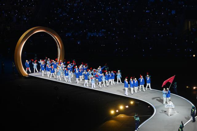 (260206) -- MILAN, Feb. 6, 2026 (Xinhua) -- The delegation of China parades into the San Siro Olympic Stadium during the opening ceremony of the Milan-Cortina 2026 Olympic Winter Games in Milan, Italy, Feb. 6, 2026. (Xinhua/Cheng Min)