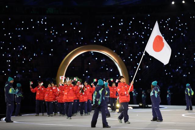 (260206) -- MILAN, Feb. 6, 2026 (Xinhua) -- The delegation of Japan parades into the San Siro Olympic Stadium during the opening ceremony of the Milan-Cortina 2026 Olympic Winter Games in Milan, Italy, Feb. 6, 2026. (Xinhua/Li Ming)