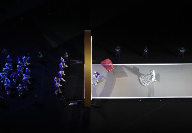 (260206) -- MILAN, Feb. 6, 2026 (Xinhua) -- The delegation of China parades into the San Siro Olympic Stadium during the opening ceremony of the Milan-Cortina 2026 Olympic Winter Games in Milan, Italy, Feb. 6, 2026. (Xinhua/Chen Yichen)