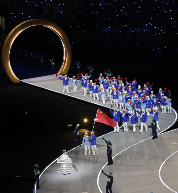 (260206) -- MILAN, Feb. 6, 2026 (Xinhua) -- The delegation of China parades into the San Siro Olympic Stadium during the opening ceremony of the Milan-Cortina 2026 Olympic Winter Games in Milan, Italy, Feb. 6, 2026. (Xinhua/Wang Kaiyan)
