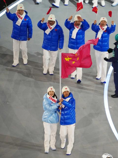 (260206) -- MILAN, Feb. 6, 2026 (Xinhua) -- The delegation of China parades into the San Siro Olympic Stadium during the opening ceremony of the Milan-Cortina 2026 Olympic Winter Games in Milan, Italy, Feb. 6, 2026. (Xinhua/Xue Yuge)