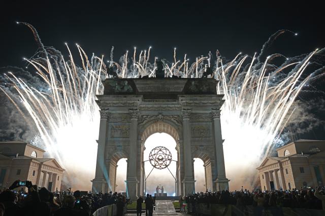 (260206) -- MILAN, Feb. 6, 2026 (Xinhua) -- Fireworks illuminate the night sky at the Arco della Pace during the opening ceremony of the Milan-Cortina 2026 Olympic Winter Games in Milan, Italy, Feb. 6, 2026. (Xinhua/Sun Fei)