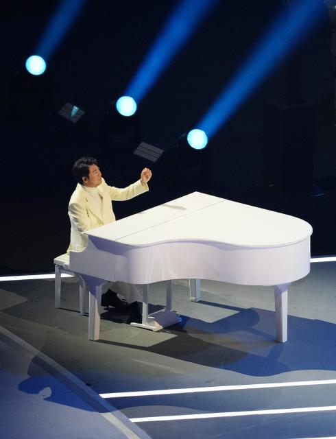 (260206) -- MILAN, Feb. 6, 2026 (Xinhua) -- Chinese pianist Lang Lang performs during the opening ceremony of the Milan-Cortina 2026 Olympic Winter Games at the San Siro Olympic Stadium in Milan, Italy, Feb. 6, 2026. (Xinhua/Xue Yuge)