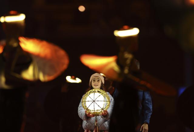 (260207) -- MILAN, Feb. 7, 2026 (Xinhua) -- A girl performs during the opening ceremony of the Milan-Cortina 2026 Olympic Winter Games at the San Siro Olympic Stadium in Milan, Italy, Feb. 6, 2026. (Xinhua/Li Ming)