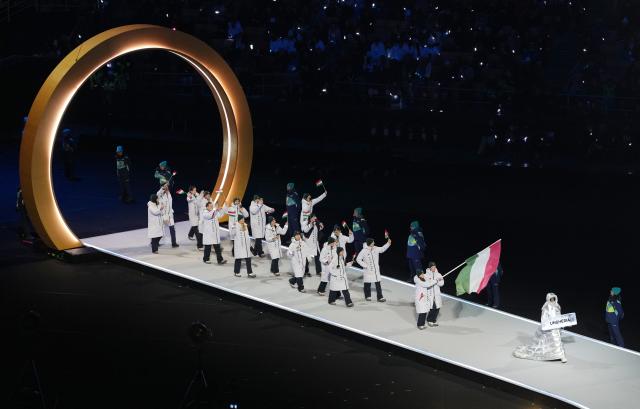 (260207) -- MILAN, Feb. 7, 2026 (Xinhua) -- The delegation of Hungary parades into the San Siro Olympic Stadium during the opening ceremony of the Milan-Cortina 2026 Olympic Winter Games in Milan, Italy, Feb. 6, 2026. (Xinhua/Xue Yuge)