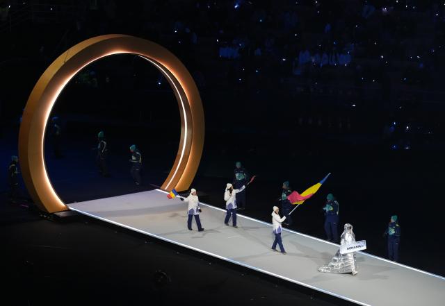 (260207) -- MILAN, Feb. 7, 2026 (Xinhua) -- The delegation of Romania parades into the San Siro Olympic Stadium during the opening ceremony of the Milan-Cortina 2026 Olympic Winter Games in Milan, Italy, Feb. 6, 2026. (Xinhua/Xue Yuge)