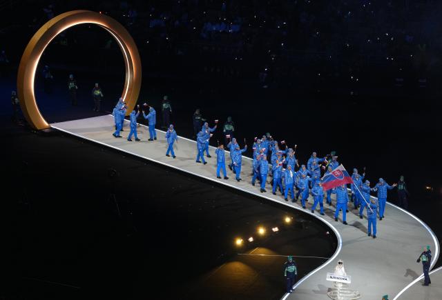 (260207) -- MILAN, Feb. 7, 2026 (Xinhua) -- The delegation of Slovakia parades into the San Siro Olympic Stadium during the opening ceremony of the Milan-Cortina 2026 Olympic Winter Games in Milan, Italy, Feb. 6, 2026. (Xinhua/Xue Yuge)