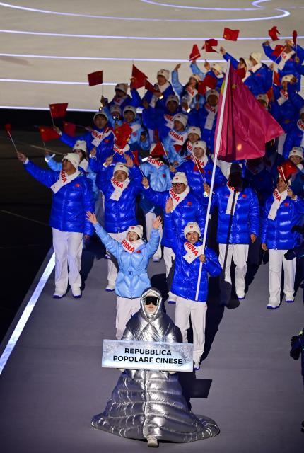 (260207) -- MILAN, Feb. 7, 2026 (Xinhua) -- The delegation of China parades into the San Siro Olympic Stadium during the opening ceremony of the Milan-Cortina 2026 Olympic Winter Games in Milan, Italy, Feb. 6, 2026. (Xinhua/Tao Xiyi)