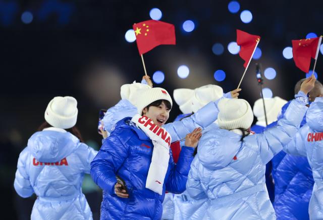 (260207) -- MILAN, Feb. 7, 2026 (Xinhua) -- The delegation of China parades into the San Siro Olympic Stadium during the opening ceremony of the Milan-Cortina 2026 Olympic Winter Games in Milan, Italy, Feb. 6, 2026. (Xinhua/Li Jing)