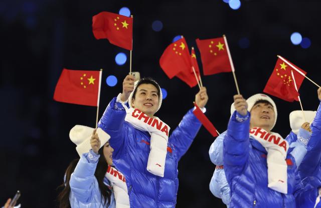 (260207) -- MILAN, Feb. 7, 2026 (Xinhua) -- The delegation of China parades into the San Siro Olympic Stadium during the opening ceremony of the Milan-Cortina 2026 Olympic Winter Games in Milan, Italy, Feb. 6, 2026. (Xinhua/Li Jing)
