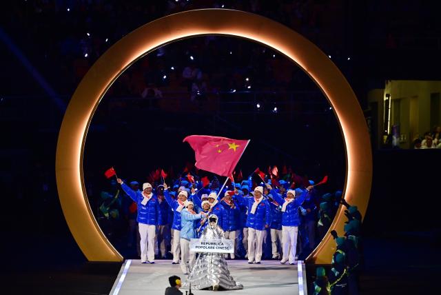 (260207) -- MILAN, Feb. 7, 2026 (Xinhua) -- The delegation of China parades into the San Siro Olympic Stadium during the opening ceremony of the Milan-Cortina 2026 Olympic Winter Games in Milan, Italy, Feb. 6, 2026. (Xinhua/Tao Xiyi)