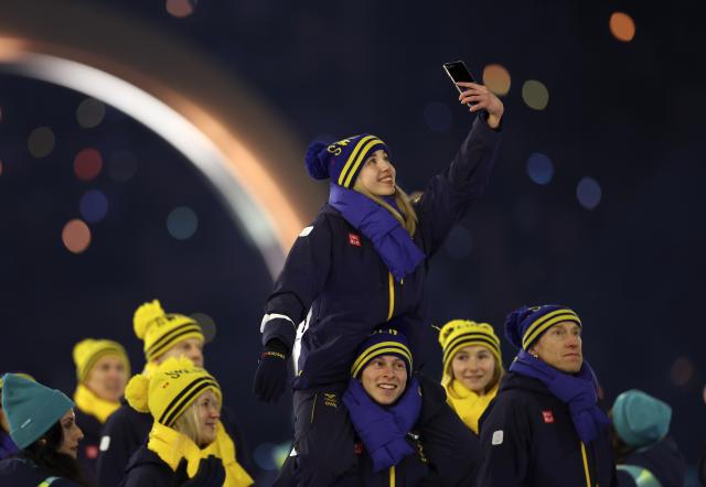(260207) -- MILAN, Feb. 7, 2026 (Xinhua) -- The delegation of Sweden parades into the San Siro Olympic Stadium during the opening ceremony of the Milan-Cortina 2026 Olympic Winter Games in Milan, Italy, Feb. 6, 2026. (Xinhua/Li Ming)