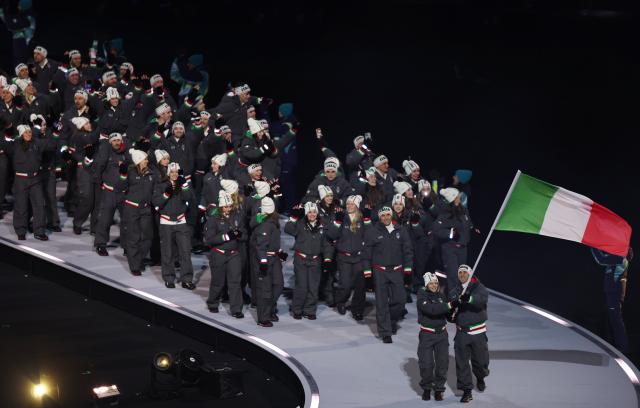 (260207) -- MILAN, Feb. 7, 2026 (Xinhua) -- The delegation of Italy parades into the San Siro Olympic Stadium during the opening ceremony of the Milan-Cortina 2026 Olympic Winter Games in Milan, Italy, Feb. 6, 2026. (Xinhua/Wang Kaiyan)
