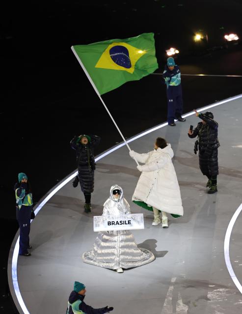 (260207) -- MILAN, Feb. 7, 2026 (Xinhua) -- The delegation of Brazil parades into the San Siro Olympic Stadium during the opening ceremony of the Milan-Cortina 2026 Olympic Winter Games in Milan, Italy, Feb. 6, 2026. (Xinhua/Wang Kaiyan)