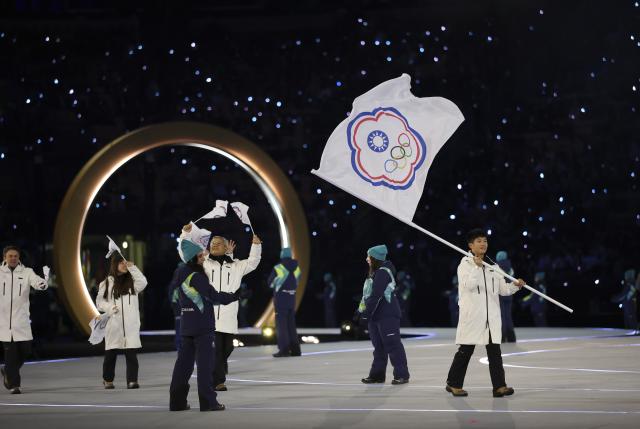 (260207) -- MILAN, Feb. 7, 2026 (Xinhua) -- The delegation of Chinese Taipei parades into the San Siro Olympic Stadium during the opening ceremony of the Milan-Cortina 2026 Olympic Winter Games in Milan, Italy, Feb. 6, 2026. (Xinhua/Li Ming)