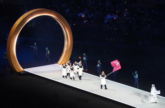 (260207) -- MILAN, Feb. 7, 2026 (Xinhua) -- The delegation of China's Hong Kong parades into the San Siro Olympic Stadium during the opening ceremony of the Milan-Cortina 2026 Olympic Winter Games in Milan, Italy, Feb. 6, 2026. (Xinhua/Xue Yuge)
