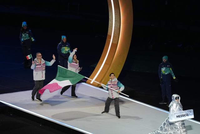 (260207) -- MILAN, Feb. 7, 2026 (Xinhua) -- The delegation of Mexico parades into the San Siro Olympic Stadium during the opening ceremony of the Milan-Cortina 2026 Olympic Winter Games in Milan, Italy, Feb. 6, 2026. (Xinhua/Xue Yuge)