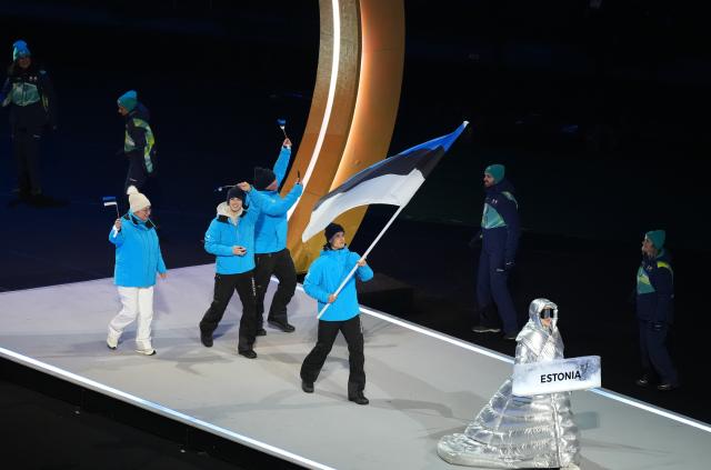 (260207) -- MILAN, Feb. 7, 2026 (Xinhua) -- The delegation of Estonia parades into the San Siro Olympic Stadium during the opening ceremony of the Milan-Cortina 2026 Olympic Winter Games in Milan, Italy, Feb. 6, 2026. (Xinhua/Xue Yuge)