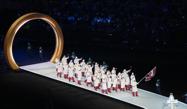 (260207) -- MILAN, Feb. 7, 2026 (Xinhua) -- The delegation of Latvia parades into the San Siro Olympic Stadium during the opening ceremony of the Milan-Cortina 2026 Olympic Winter Games in Milan, Italy, Feb. 6, 2026. (Xinhua/Xue Yuge)