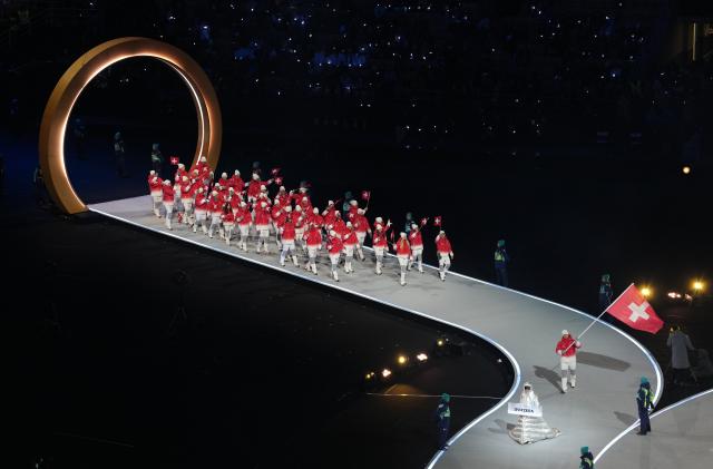 (260207) -- MILAN, Feb. 7, 2026 (Xinhua) -- The delegation of Switzerland parades into the San Siro Olympic Stadium during the opening ceremony of the Milan-Cortina 2026 Olympic Winter Games in Milan, Italy, Feb. 6, 2026. (Xinhua/Xue Yuge)