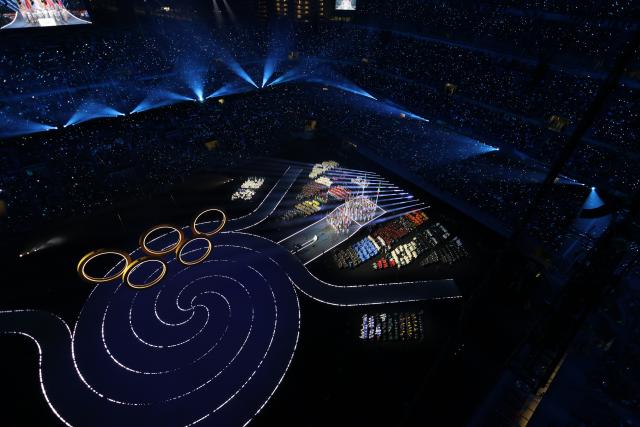 (260207) -- MILAN, Feb. 7, 2026 (Xinhua) -- This photo taken on Feb. 6, 2026 shows the Olympic rings at the opening ceremony of the Milan-Cortina 2026 Olympic Winter Games at the San Siro Olympic Stadium in Milan, Italy. (Xinhua/Chen Yichen)