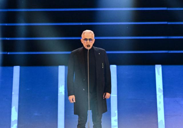 (260207) -- MILAN, Feb. 7, 2026 (Xinhua) -- Andrea Bocelli performs during the opening ceremony of the Milan-Cortina 2026 Olympic Winter Games at the San Siro Olympic Stadium in Milan, Italy, Feb. 6, 2026. (Xinhua/Zhang Haofu)