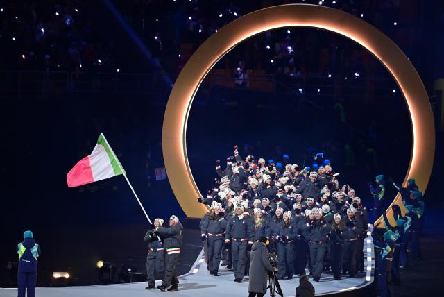 (260207) -- MILAN, Feb. 7, 2026 (Xinhua) -- The delegation of Italy parades into the San Siro Olympic Stadium during the opening ceremony of the Milan-Cortina 2026 Olympic Winter Games in Milan, Italy, Feb. 6, 2026. (Xinhua/Tao Xiyi)
