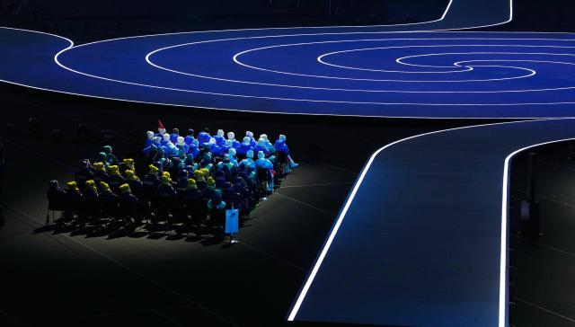 (260207) -- MILAN, Feb. 7, 2026 (Xinhua) -- The delegation of the People's Republic of China (rear) is seen during the opening ceremony of the Milan-Cortina 2026 Olympic Winter Games at the San Siro Olympic Stadium in Milan, Italy, Feb. 6, 2026. (Xinhua/Tao Xiyi)