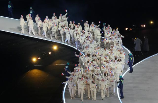 (260207) -- MILAN, Feb. 7, 2026 (Xinhua) -- The delegation of France parades into the San Siro Olympic Stadium during the opening ceremony of the Milan-Cortina 2026 Olympic Winter Games in Milan, Italy, Feb. 6, 2026. (Xinhua/Lai Xiangdong)