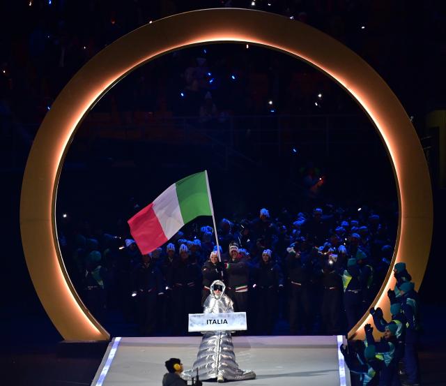 (260207) -- MILAN, Feb. 7, 2026 (Xinhua) -- The delegation of Italy parades into the San Siro Olympic Stadium during the opening ceremony of the Milan-Cortina 2026 Olympic Winter Games in Milan, Italy, Feb. 6, 2026. (Xinhua/Tao Xiyi)
