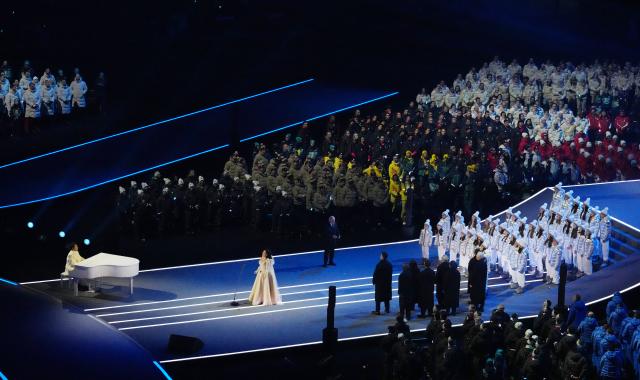 (260207) -- MILAN, Feb. 7, 2026 (Xinhua) -- Chinese pianist Lang Lang (1st L) and Italian opera singer Cecilia Bartoli (2nd L) perform during the opening ceremony of the Milan-Cortina 2026 Olympic Winter Games at the San Siro Olympic Stadium in Milan, Italy, Feb. 6, 2026. (Xinhua/Lai Xiangdong)