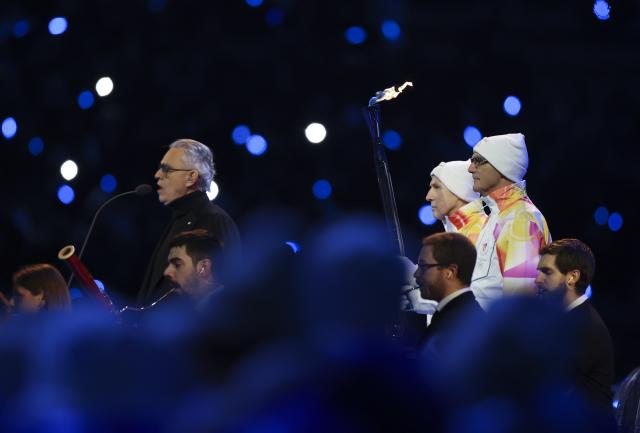 (260207) -- MILAN, Feb. 7, 2026 (Xinhua) -- Andrea Bocelli (1st L) performs during the opening ceremony of the Milan-Cortina 2026 Olympic Winter Games at the San Siro Olympic Stadium in Milan, Italy, Feb. 6, 2026. (Xinhua/Li Ming)