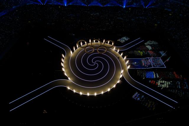 (260207) -- MILAN, Feb. 7, 2026 (Xinhua) -- This photo taken on Feb. 6, 2026 shows the Olympic rings at the opening ceremony of the Milan-Cortina 2026 Olympic Winter Games at the San Siro Olympic Stadium in Milan, Italy. (Xinhua/Chen Yichen)