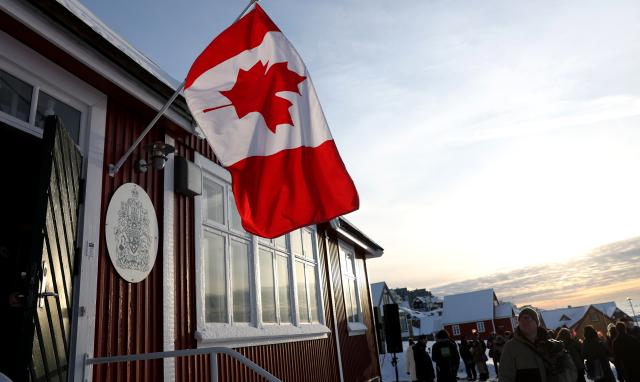 (260207) -- BEIJING, Feb. 7, 2026 (Xinhua) -- Photo taken on Feb. 6, 2026 shows a Canadian flag outside Canada's new consulate in Nuuk, the capital of Greenland, Denmark. On Friday, France and Canada each opened a consulate in Nuuk. (Xinhua/Li Ying)
