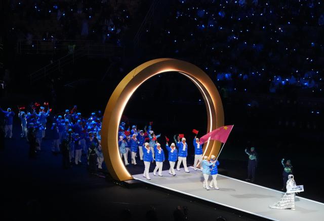 (260207) -- BEIJING, Feb. 7, 2026 (Xinhua) -- The delegation of China parades into the San Siro Olympic Stadium during the opening ceremony of the Milan-Cortina 2026 Olympic Winter Games in Milan, Italy, Feb. 6, 2026. (Xinhua/Lai Xiangdong)
