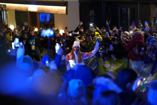 (260207) -- CORTINA D'AMPEZZO, Feb. 7, 2026 (Xinhua) -- Torchbearer Sofia Goggia of Italy carries the Olympic torch during the opening ceremony of the Milan-Cortina 2026 Olympic Winter Games in Cortina, Italy, Feb. 6, 2026. (Xinhua/Fei Maohua)