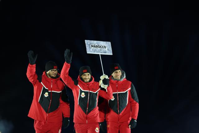 (260207) -- PREDAZZO, Feb. 7, 2026 (Xinhua) -- The delegation of Morocco parades into the Predazzo Ski Jumping Stadium during the opening ceremony of the Milan-Cortina 2026 Olympic Winter Games in Predazzo, Italy, Feb. 6, 2026. (Xinhua/Huang Wei)