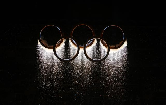 (260207) -- MILAN, Feb. 7, 2026 (Xinhua) -- This photo taken on Feb. 6, 2026 shows the Olympic rings at the opening ceremony of the Milan-Cortina 2026 Olympic Winter Games at the San Siro Olympic Stadium in Milan, Italy. (Xinhua/Xue Yuge)