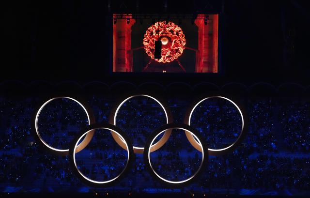 (260207) -- MILAN, Feb. 7, 2026 (Xinhua) -- This photo taken on Feb. 6, 2026 shows the Olympic rings at the opening ceremony of the Milan-Cortina 2026 Olympic Winter Games at the San Siro Olympic Stadium in Milan, Italy. (Xinhua/Xue Yuge)