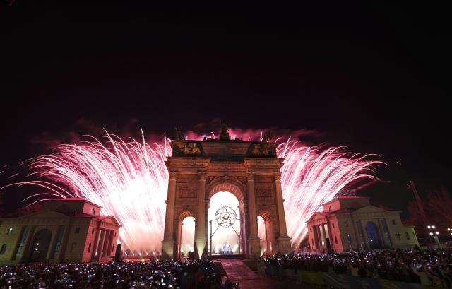 (260207) -- MILAN, Feb. 7, 2026 (Xinhua) -- Fireworks illuminate the night sky at the Arco della Pace during the opening ceremony of the Milan-Cortina 2026 Olympic Winter Games in Milan, Italy, Feb. 6, 2026. (Xinhua/Sun Fei)