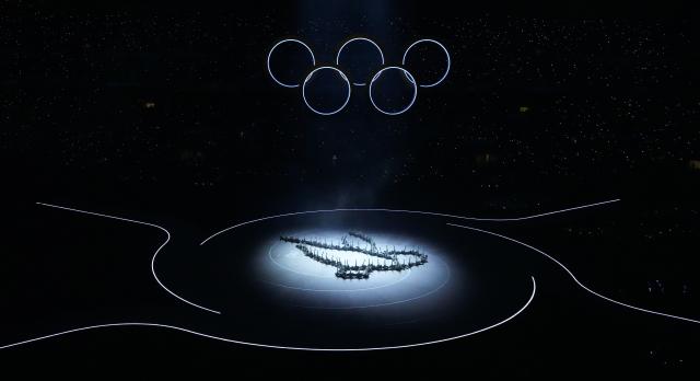 (260207) -- MILAN, Feb. 7, 2026 (Xinhua) -- This photo taken on Feb. 6, 2026 shows the Olympic rings at the opening ceremony of the Milan-Cortina 2026 Olympic Winter Games at the San Siro Olympic Stadium in Milan, Italy. (Xinhua/Lai Xiangdong)