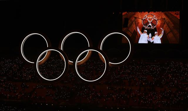 (260207) -- MILAN, Feb. 7, 2026 (Xinhua) -- This photo taken on Feb. 6, 2026 shows the Olympic rings at the opening ceremony of the Milan-Cortina 2026 Olympic Winter Games at the San Siro Olympic Stadium in Milan, Italy. (Xinhua/Wang Kaiyan)