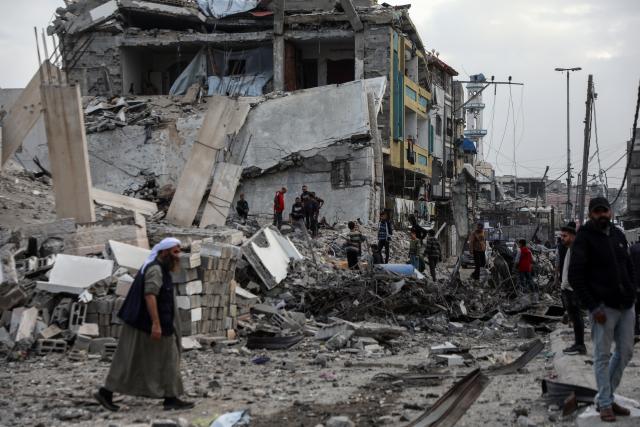 (260207) -- GAZA, Feb. 7, 2026 (Xinhua) -- Palestinians inspect the damage after an Israeli airstrike that destroyed a three-story building in the Zeitoun neighborhood, southeast of Gaza City, on Feb. 6, 2026. (Photo by Rizek Abdeljawad/Xinhua)