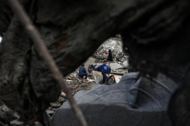 (260207) -- GAZA, Feb. 7, 2026 (Xinhua) -- Palestinians inspect the damage after an Israeli airstrike that destroyed a three-story building in the Zeitoun neighborhood, southeast of Gaza City, on Feb. 6, 2026. (Photo by Rizek Abdeljawad/Xinhua)