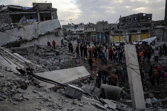 (260207) -- GAZA, Feb. 7, 2026 (Xinhua) -- Palestinians inspect the damage after an Israeli airstrike that destroyed a three-story building in the Zeitoun neighborhood, southeast of Gaza City, on Feb. 6, 2026. (Photo by Rizek Abdeljawad/Xinhua)