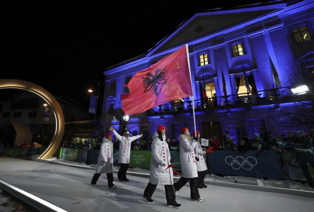 (260207) -- CORTINA D'AMPEZZO, Feb. 7, 2026 (Xinhua) -- The delegation of Albania parades into the City Center during the opening ceremony of the Milan-Cortina 2026 Olympic Winter Games in Cortina, Italy, Feb. 6, 2026. (Xinhua/Zhang Chenlin)